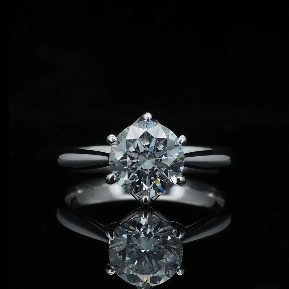 18K/Platinum Solitaire Crisscross Ring Setting